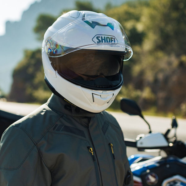 man wearing white helmet with visor up collection