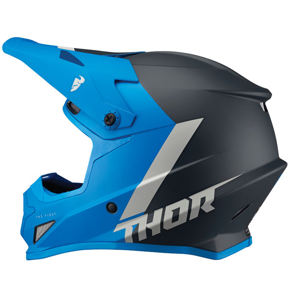 Studio view of Thor - Sector Chev Helmet helmet helmet, in Red and Navy, vented chin bar and intake ports, on a clean white background, (SKU 011073) Colors: Blue and Light Gray, Charcoal and Orange, Gray and Black, Red and Navy Sizes: 2XL, 3XL, 4XL, LG, MD, SM, XL, XS