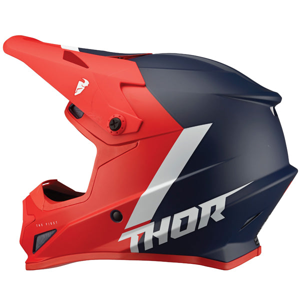 Studio view of Thor - Sector Chev Helmet helmet helmet, in Red and Navy, vented chin bar and intake ports, on a clean white background, (SKU 011073) Colors: Blue and Light Gray, Charcoal and Orange, Gray and Black, Red and Navy Sizes: 2XL, 3XL, 4XL, LG, MD, SM, XL, XS