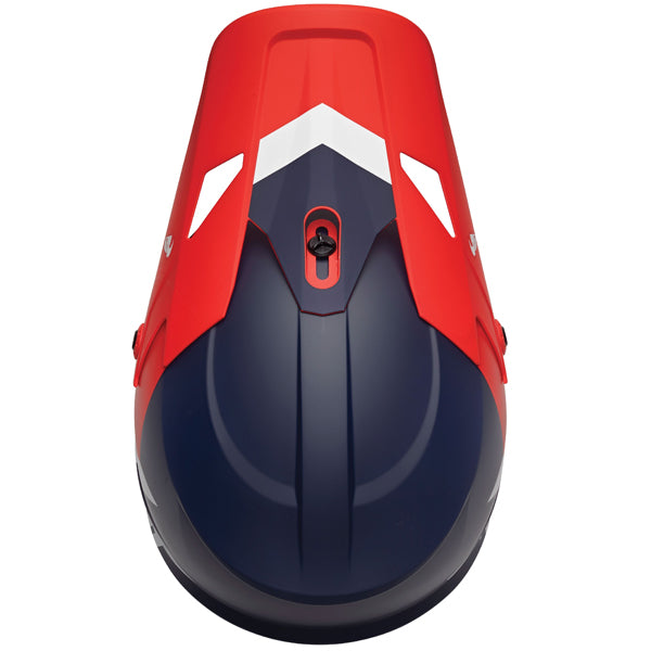 Three-quarter view of Thor - Sector Chev Helmet helmet helmet, in Red and Navy, vented chin bar and intake ports, on a clean white background, (SKU 011073) Colors: Blue and Light Gray, Charcoal and Orange, Gray and Black, Red and Navy Sizes: 2XL, 3XL, 4XL, LG, MD, SM, XL, XS