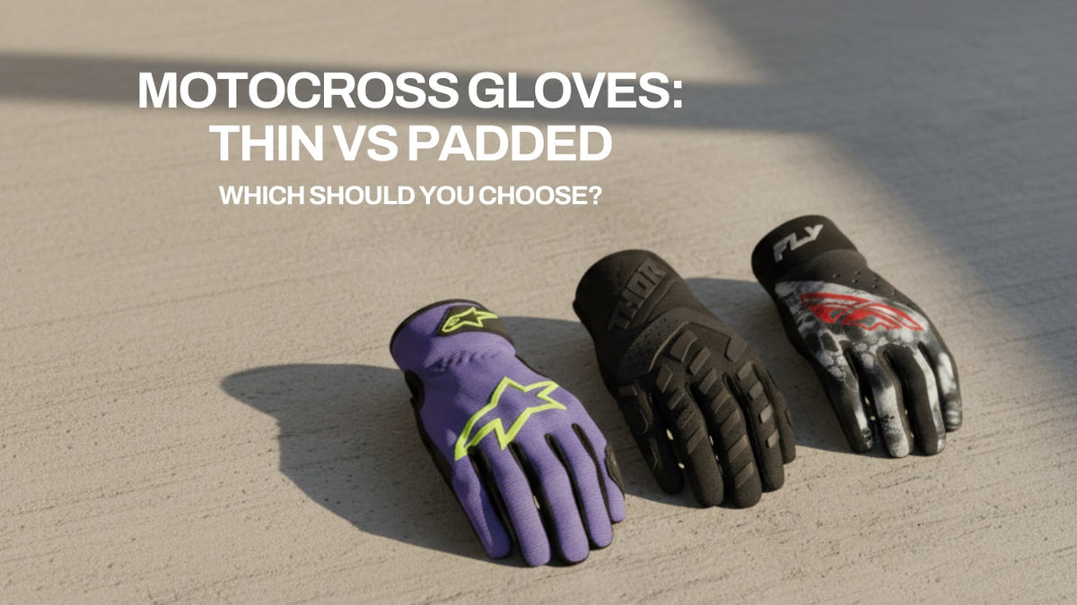 Three motocross gloves—Alpinestars, Thor, and Fly Racing—arranged on concrete with text ‘Motocross Gloves: Thin vs Padded – Which Should You Choose?’