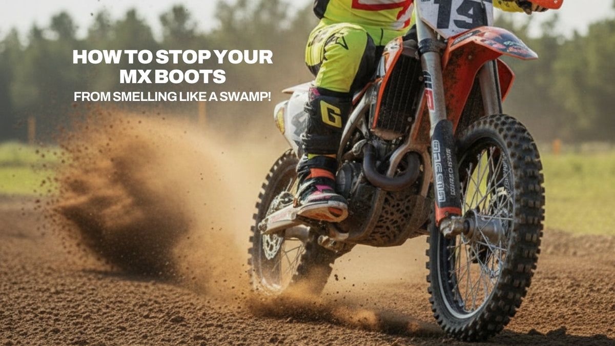 A motocross rider kicking up a large roost of dirt on a track, with the title text: How to Stop Your MX Boots From Smelling Like a Swamp!
