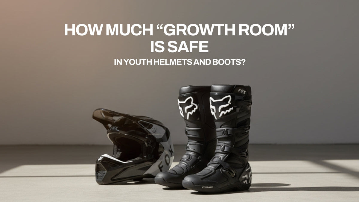 A black motocross helmet and a pair of black motocross boots are sitting on a light gray surface with a darker gray background. The text "HOW MUCH 'GROWTH ROOM' IS SAFE IN YOUTH HELMETS AND BOOTS?" is overlaid on the image.