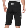 Studio image highlighting 100%, R-Core X Shorts (MTB), SKU 50010166, color Black, sizes 28–38, Designed for Mountain Bike, BMX and E-Bike riders