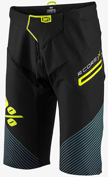Catalog studio image of 100%, R-Core-X DH Short (MTB), Shorts, SKU 42001-001-32, color Black, sizes 30–32, Designed for Mountain Bike, BMX and E-Bike riders