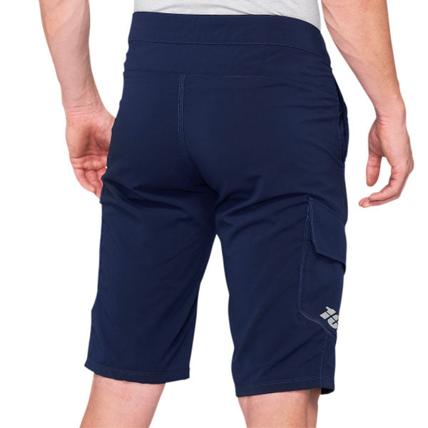 Studio image highlighting 100%, Ridecamp Short (MTB), Shorts, SKU 50010017, color options Black, Charcoal, Navy, sizes 28–38, Designed for Mountain Bike, BMX and E-Bike riders