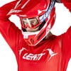 Lifestyle view: rider in Leatt V26 Moto 3.5 jersey, Red, SKU 5026020560 — durable, stain-resistant dirt bike top. | SKU: 5026020543 | Available at BTO Sports