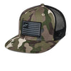 Alpinestars Flag Flat Trucker Hat SKU 48276369, camo green and brown pattern with black mesh back, flat bill, front patch featuring Alpinestars logo with American flag design.