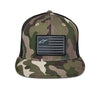 Front view of Alpinestars Flag Flat Trucker Hat SKU 48276369, camo style with flat bill, stitched patch showing Alpinestars star logo and flag stripes for moto streetwear.