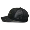 Alpinestars Recon Camo Trucker Hat, SKU 1235-81470, black camouflage pattern, left side view. This durable motocross hat shows the structured crown and curved bill with a black Alpinestars logo patch on the side of the mesh back.