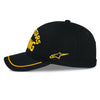 SKU 4827640 Alpinestars Luminary Hat in black and yellow, left side profile with yellow embroidered Alpinestars star logo on side panel and racing-inspired style for motocross riders.