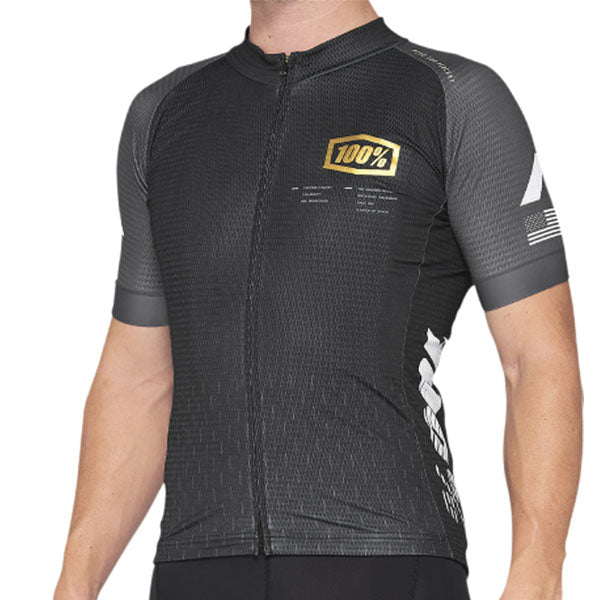 Studio product photo on a neutral background of 100%, Exceeda Jersey (MTB), SKU 50200071, color Black/Charcoal, sizes SM, MD, LG, XL, Designed for Mountain Bike, BMX and E-Bike riders