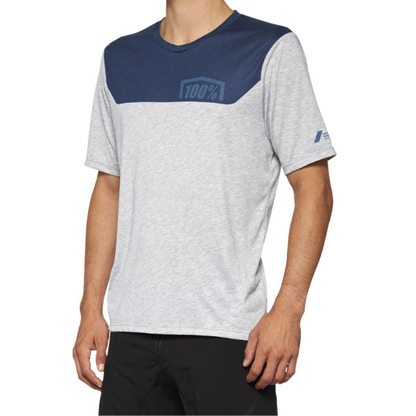 Catalog studio image of 100%, Airmatic Jersey (MTB), SKU 50200063, color options Black/Charcoal, Gray/Midnight, sizes SM, MD, LG, XL, Designed for Mountain Bike, BMX and E-Bike riders