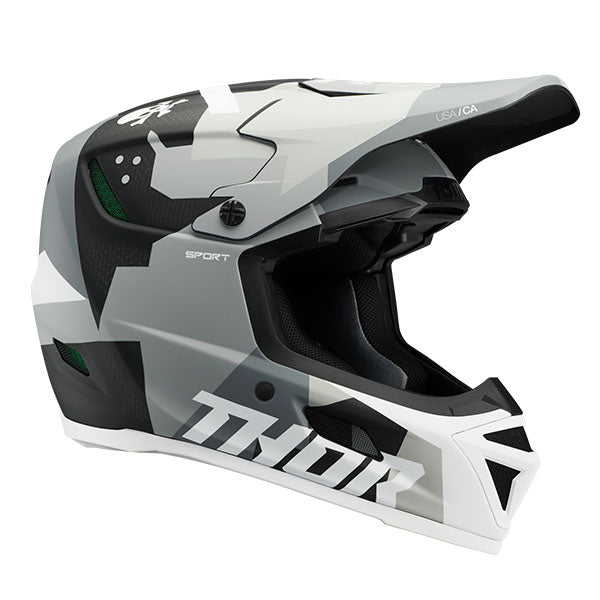 Studio view of Thor Thor - Reflex Sport Carbon Brave MIPS Helmet helmet, in Gray and White, MIPS-equipped, carbon shell, on a clean white background, for motocross / off-road use, (SKU 011087) Colors: Gray and White Sizes: 2XL, LG, MD, SM, XL, XS