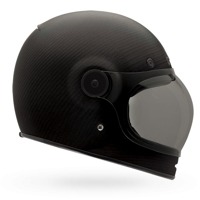 Bell Helmets Bell - Bullitt Carbon Helmet motorcycle helmet, showing aerodynamic shell design, ventilation ports, and secure retention system built for rider comfort and protection. SKU 07062216.