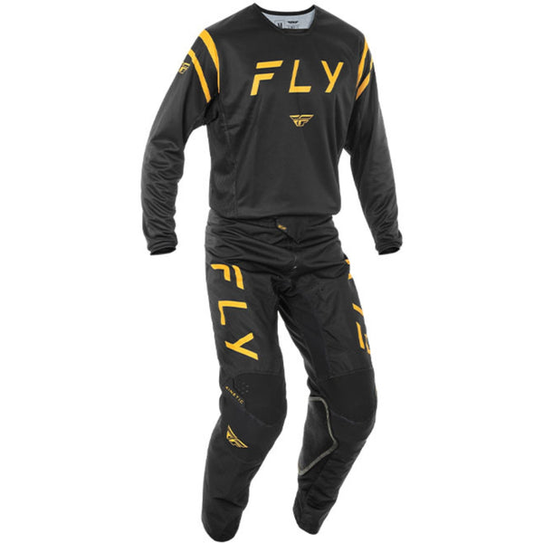 Black and yellow Fly motocross outfit on a white background