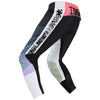 Left side profile of Fox Racing Flexair Grid Pants in Black and Purple (SKU: 33546-166), highlighting TruMotion® stretch zones