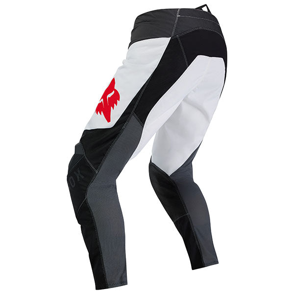 Side view of Black/White 180 Flow Pants (SKU: 33703-077), showing TruMotion® stretch zones