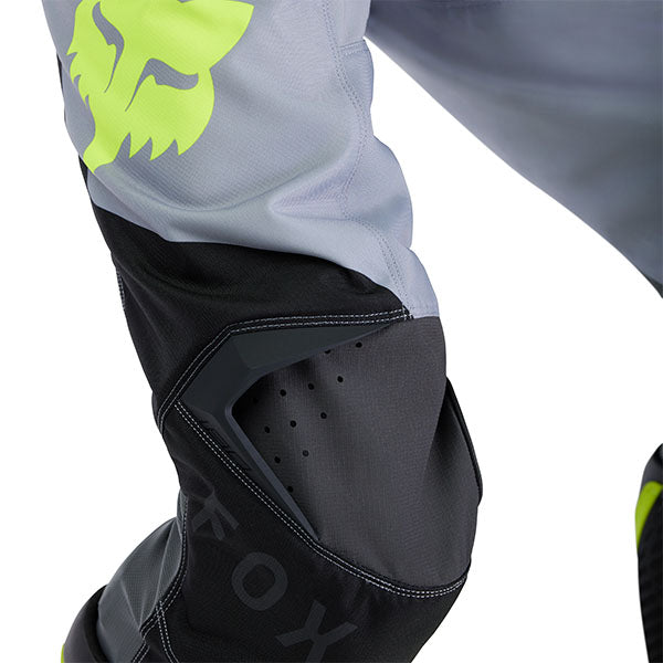 Side angle of White/Red 180 Flow Pants (SKU: 33703-019), emphasizing articulated fit