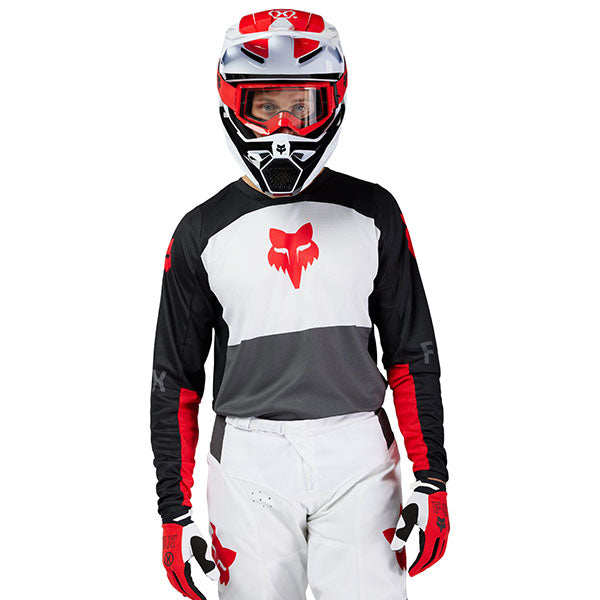 Rear view of Black/White 180 Flow Jersey (SKU: 33702-077), highlighting drop-tail hem