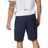 Lifestyle image of model wearing Fox Racing Essex 3.0 Shorts in Olive Green, SKU 31667-329