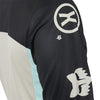 Side angle of Fox Racing 180 Hello Future Jersey in Black and Blue (SKU: 33534-001), emphasizing ergonomic cut