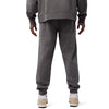 Lifestyle image of model wearing Fox Racing Wordmark Joggers in Pewter, SKU 33146-052, styled with matching top