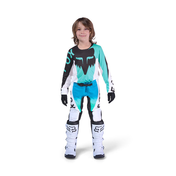 Front view of purple and black Fox Racing Youth motocross jersey and pants on young model