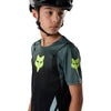 Fox Racing Ranger Foundry Jersey (MTB) (Youth) in Sage, modeled front three-quarter view, with the crew neck, long sleeves, contrasting shoulder and arm graphics, and extended rear hem on a rider. Available options—Color: Sage; Size: Y-SM, YMD, Y-LG, Y-XL. SKU 40165-221-YL. UPC 198571120279.