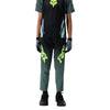 Fox Racing Ranger Foundry Pants (MTB) (Youth) in Sage, close-up of the side thigh and knee panels, with the ratcheting waist adjuster, stretch yoke, shaped hip panel, and reinforced knee or thigh material. Available options—Color: Sage; Size: Y-22, Y-24, Y-26, Y-28.