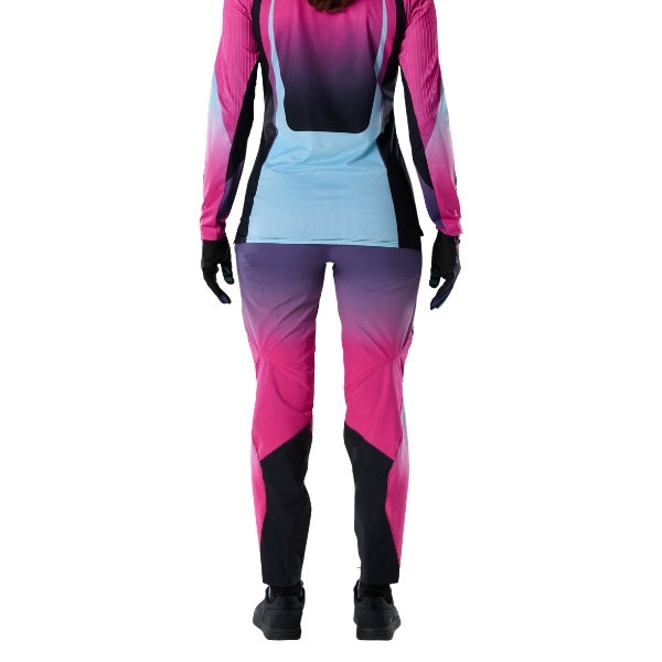 Fox Racing Flexair SE TS57 Pants (MTB) (Womens) in Pink, rear lower-leg and cuff view, with the reinforced seat, rear yoke, articulated knees, tapered legs, and lower-leg graphics. Available options—Color: Pink; Size: 2, 4, 6, 8, 10, 12, 14, 16. SKU 40264-170-12. UPC 198571134931.
