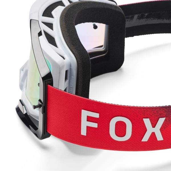 Fox Racing Airspace Clutch Goggles in Neon Pink, rear view of the branded strap, with the wide elastic strap, silicone grip bands, woven Fox lettering, and rear frame edge. Available options—Color: White/Black, Neon Pink.