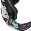 Fox Racing Vue Apex Vivid Goggles in Black, side view of the frame and strap attachment, with the wide elastic strap, silicone grip bands, woven Fox lettering, and rear frame edge. Available options—Color: Black.
