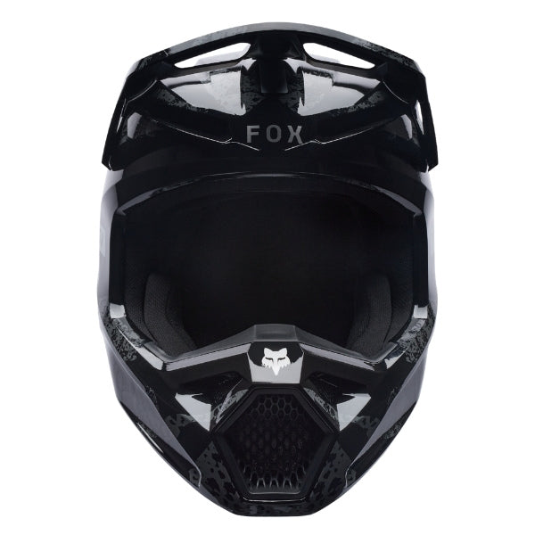Fox Racing V1 BNKR Helmet in Black Camo, front view, with the visor, wide goggle opening, vented chin bar, and brow vents centered in the frame. Available options—Color: Black Camo; Size: XS, SM, MD, LG, XL, 2X. SKU 40602-247-M. UPC 198571123263.