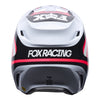 Fox Racing V1 Draft Helmet in White, rear view, with the rear shell vents, lower neck opening, molded shell ribs, and Fox lettering. Available options—Color: White, Black, Sunburst; Size: XS, SM, MD, LG, XL, 2X. SKU 40609-008-L. UPC 198571132111.