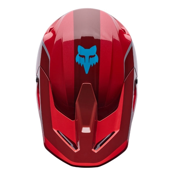 Fox Racing V1 Raid Helmet in Rust, top view, with the visor tip, crown vents, shell graphics, and central Fox logo. Available options—Color: Rust, Purple Lava, Emerald; Size: XS, SM, MD, LG, XL, 2X. SKU 40616-180-XL. UPC 198571130780.