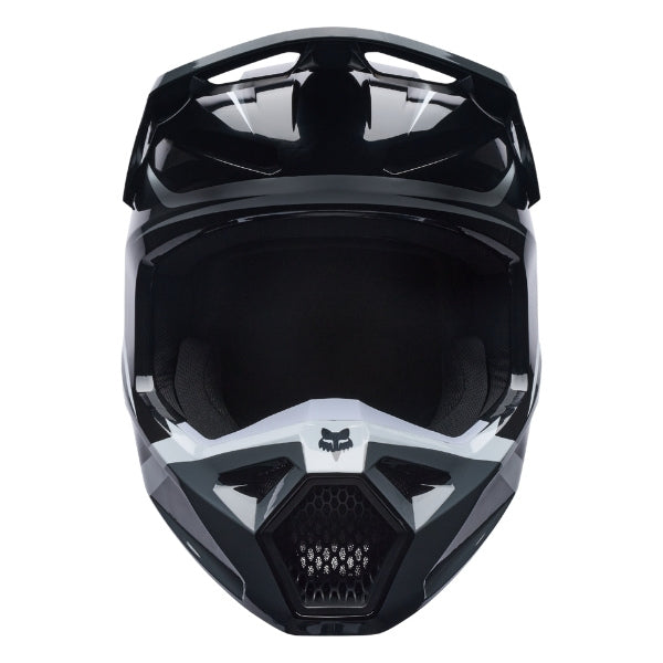 Fox Racing V1 Frame Helmet (Youth) in Black, front view, with the visor, wide goggle opening, vented chin bar, and brow vents centered in the frame. Available options—Color: Black, Neon Pink, Blue, Grey/Yellow, Red; Size: Y-SM, Y-MD, Y-LG. SKU 40617-001-YL. UPC 198571121733.