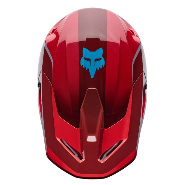 Fox Racing V1 Raid Helmet (Youth) in Purple Lava, right-side profile, with the extended visor, open face port, angular chin bar, side vents, and Fox graphics. Available options—Color: Rust, Purple Lava; Size: Y-SM, Y-MD, Y-LG. SKU 40618-E07-YM. UPC 198571129203.