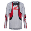 Fox Racing 180 Honda Jersey in White/Red, front product view, with the crew neck, long sleeves, large Fox chest graphic, contrasting arm panels, and curved drop-tail hem. Available options—Color: White/Red; Size: XS, SM, MD, LG, XL, 2X. SKU 40652-077-XS. UPC 198571132715.