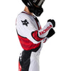 Fox Racing 180 Honda Jersey in White/Red, close-up of the chest and shoulder panels, with the printed Fox artwork, mesh-knit texture, reinforced seam lines, and shaped cuff or hem. Available options—Color: White/Red; Size: XS, SM, MD, LG, XL, 2X. SKU 40652-077-L. UPC 198571132746.