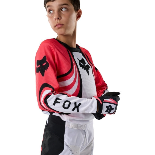 Fox Racing 180 Draft Jersey (Youth) in White, close-up of the chest and shoulder panels, with the printed Fox artwork, mesh-knit texture, reinforced seam lines, and shaped cuff or hem. Available options—Color: White, Sunburst; Size: Y-SM, Y-MD, Y-LG, Y-XL. SKU 40654-008-YXL. UPC 198571132234.