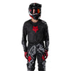 Fox Racing 180 Abyss Jersey in Black, close-up of the sleeve graphic and cuff, with the printed Fox artwork, mesh-knit texture, reinforced seam lines, and shaped cuff or hem. Available options—Color: Black; Size: XS, SM, MD, LG, XL, 2X. SKU 40656-001-XL. UPC 198571122303.