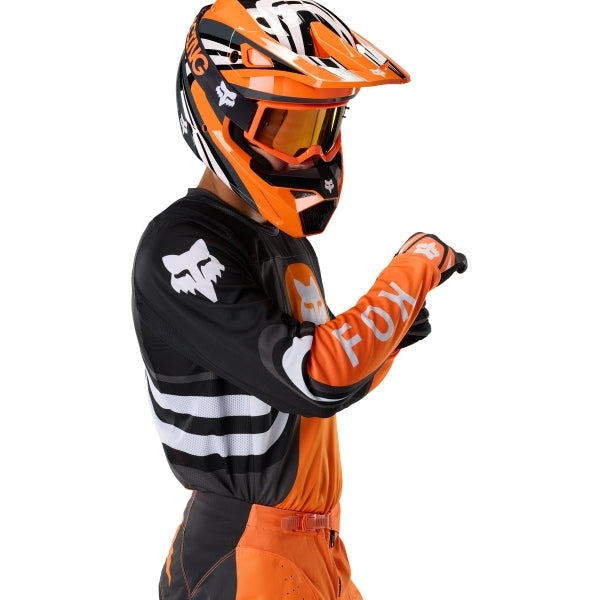 Fox Racing 180 Draft Jersey in Sunburst, close-up of the chest and shoulder panels, with the printed Fox artwork, mesh-knit texture, reinforced seam lines, and shaped cuff or hem. Available options—Color: White, Black, Sunburst; Size: XS, SM, MD, LG, XL, 2X. SKU 40657-460-L. UPC 198571131596.