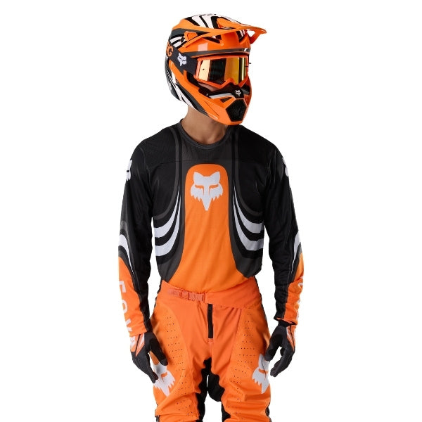 Fox Racing 180 Draft Jersey in Sunburst, close-up of the sleeve graphic and cuff, with the printed Fox artwork, mesh-knit texture, reinforced seam lines, and shaped cuff or hem. Available options—Color: White, Black, Sunburst; Size: XS, SM, MD, LG, XL, 2X. SKU 40657-460-XL. UPC 198571131602.