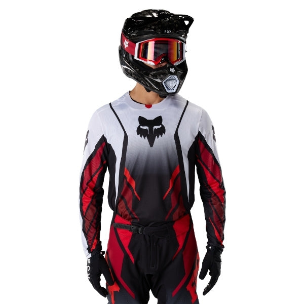 Fox Racing 360 Foundry Jersey in Sky Blue, front product view, with the crew neck, long sleeves, large Fox chest graphic, contrasting arm panels, and curved drop-tail hem. Available options—Color: Black/Grey, Flo Red, Sky Blue, HiViz Yellow; Size: SM, MD, LG, XL, 2X. SKU 40664-D67-S. UPC 198571131237.