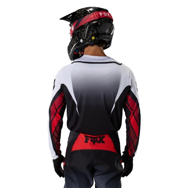 Fox Racing 360 Foundry Jersey in Sky Blue, rear product view, with the back graphic, shoulder panels, long sleeves, and drop-tail hem. Available options—Color: Black/Grey, Flo Red, Sky Blue, HiViz Yellow; Size: SM, MD, LG, XL, 2X. SKU 40664-D67-M. UPC 198571131244.