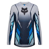 Fox Racing 360 Foundry Jersey in Sky Blue, modeled front three-quarter view, with the crew neck, long sleeves, contrasting shoulder and arm graphics, and extended rear hem on a rider. Available options—Color: Black/Grey, Flo Red, Sky Blue, HiViz Yellow; Size: SM, MD, LG, XL, 2X. SKU 40664-D67-L. UPC 198571131251.