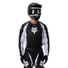 Fox Racing 180 Frame Jersey in Black, close-up of the sleeve graphic and cuff, with the printed Fox artwork, mesh-knit texture, reinforced seam lines, and shaped cuff or hem. Available options—Color: Blue, Grey/Yellow, Black, Red; Size: XS, SM, MD, LG, XL, 2X, 3X. SKU 40665-001-XL. UPC 198571122235.