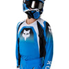Fox Racing 180 Frame Jersey in Blue, modeled front three-quarter view, with the crew neck, long sleeves, contrasting shoulder and arm graphics, and extended rear hem on a rider. Available options—Color: Blue, Grey/Yellow, Black, Red; Size: XS, SM, MD, LG, XL, 2X, 3X. SKU 40665-002-M. UPC 198571124017.