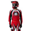Fox Racing 180 Frame Jersey in Red, close-up of the chest and shoulder panels, with the printed Fox artwork, mesh-knit texture, reinforced seam lines, and shaped cuff or hem. Available options—Color: Blue, Grey/Yellow, Black, Red; Size: XS, SM, MD, LG, XL, 2X, 3X. SKU 40665-003-L. UPC 198571129869.